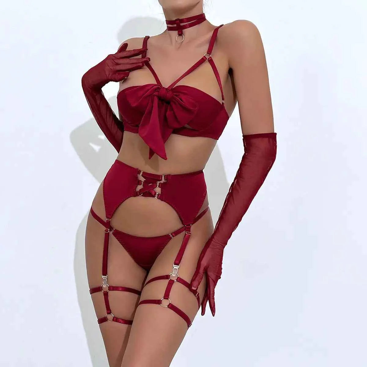 Red lingerie set with gloves on a white background